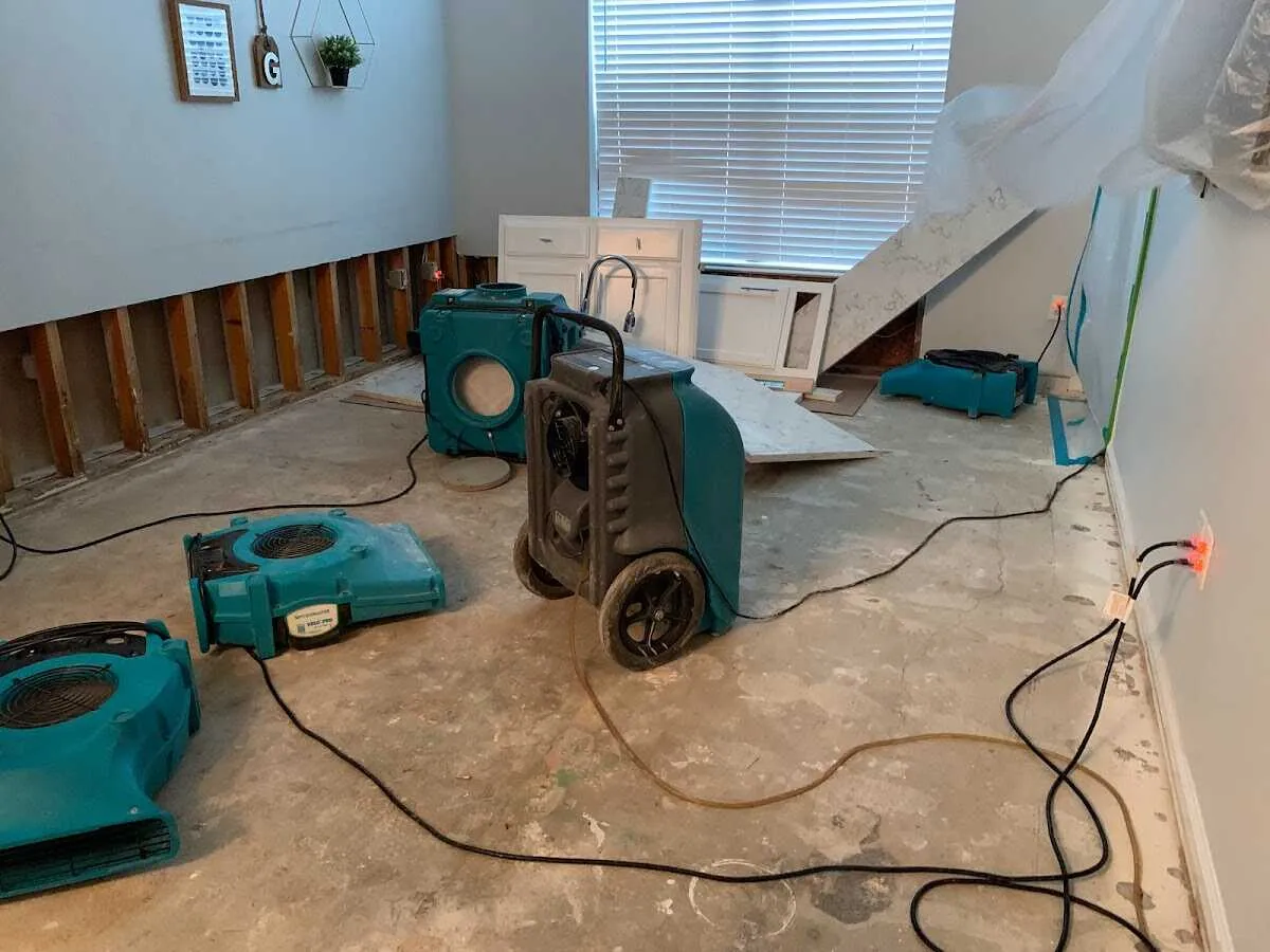 Dehumidifier in flood-cut room for Water Damage Restoration in Stoughton